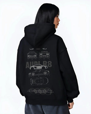 Black hoodie worn by a female model, back view, featuring Audi R8 v10 euro enthusiast racing street performance graphic.