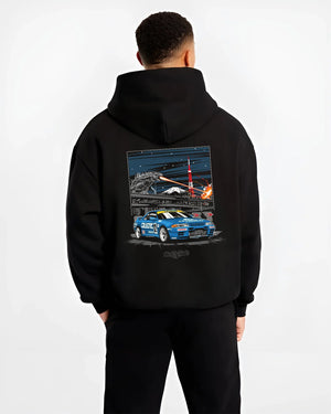 Black hoodie worn by a male model, back view, featuring rs jdm japanese tuner street retro enthusiast racing graphic.