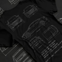 Black T-shirt laid flat with natural fabric folds, featuring Audi RS7 rs turbo racing german street performance graphic.