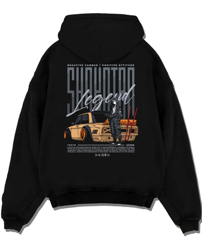 Black pullover hoodie laid flat on a white background, featuring Toyota jdm stance legend racing street performance graphic.