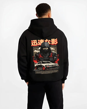 Black hoodie worn by a male model, back view, featuring Nissan SKYLINE r34 ninja drift jdm japanese street speed graphic.