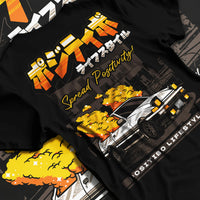 Black T-shirt laid flat with natural fabric folds, featuring Toyota AE86 drift jdm racing street performance motorsport graphic.