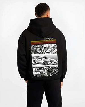 Black hoodie worn by a male model, back view, featuring Toyota Supra rs racing jdm tuner street vintage enthusiast graphic.