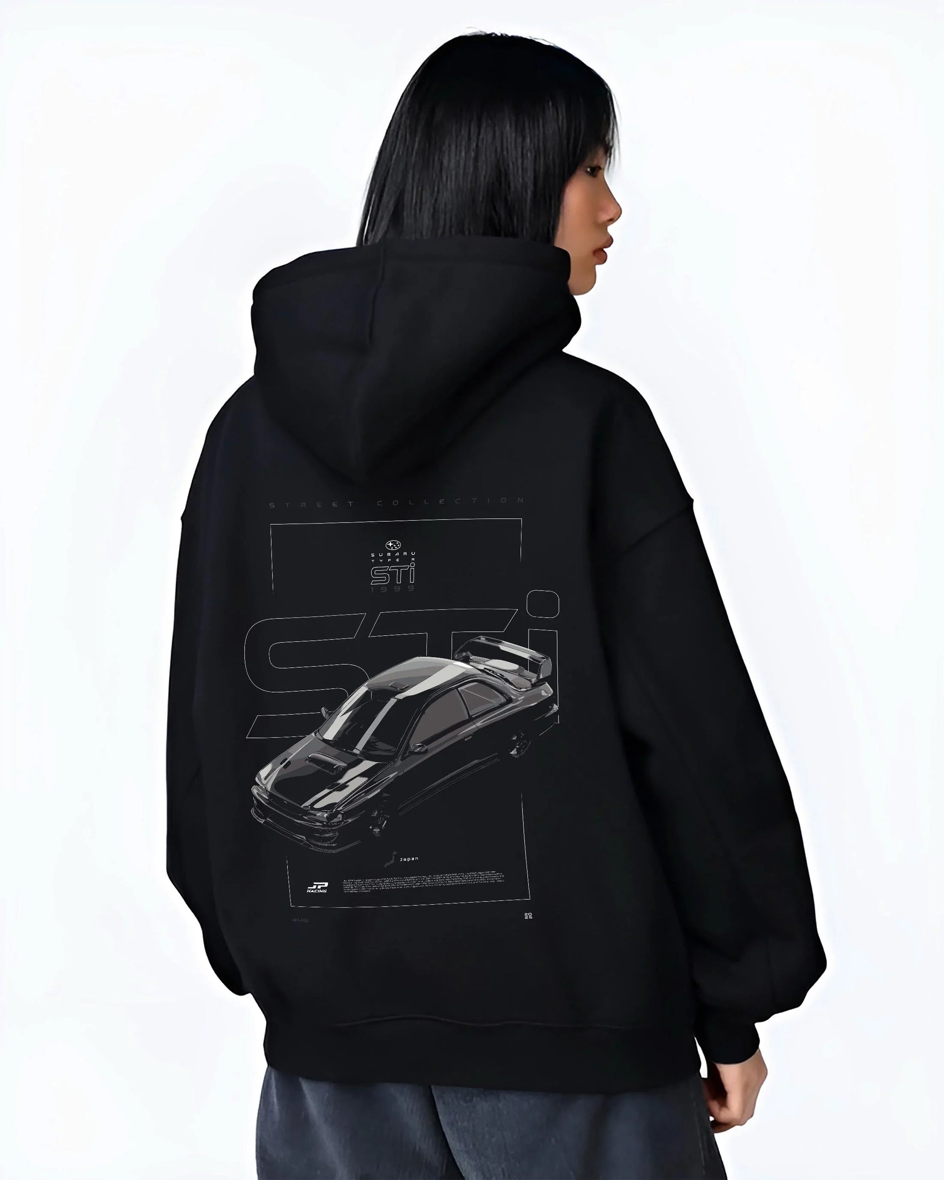 Black hoodie worn by a female model, back view, featuring SUBARU WRX type r sti drift rally jdm japanese street retro graphic.