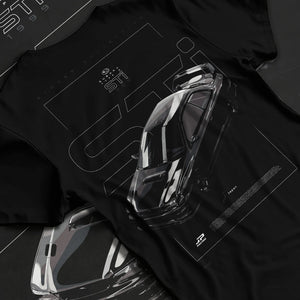 Black T-shirt laid flat with natural fabric folds, featuring SUBARU WRX type r sti drift rally jdm japanese street retro graphic.